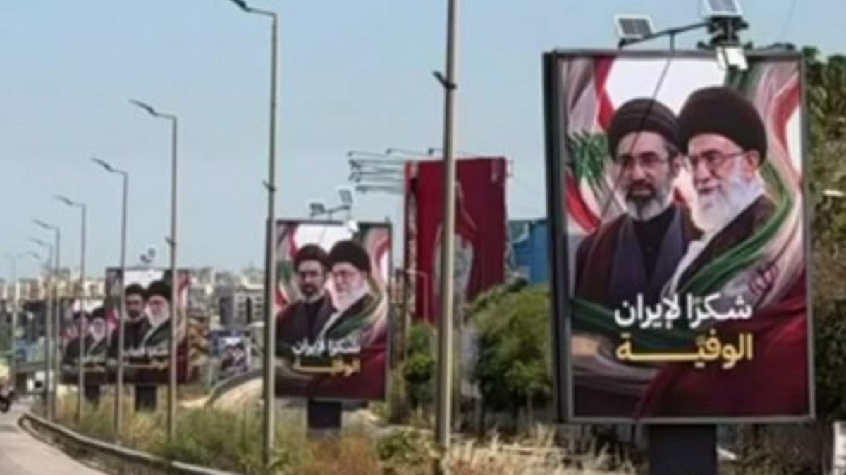 صورة للافتات على طريق المطار: "شكرًا لإيران الوفية"