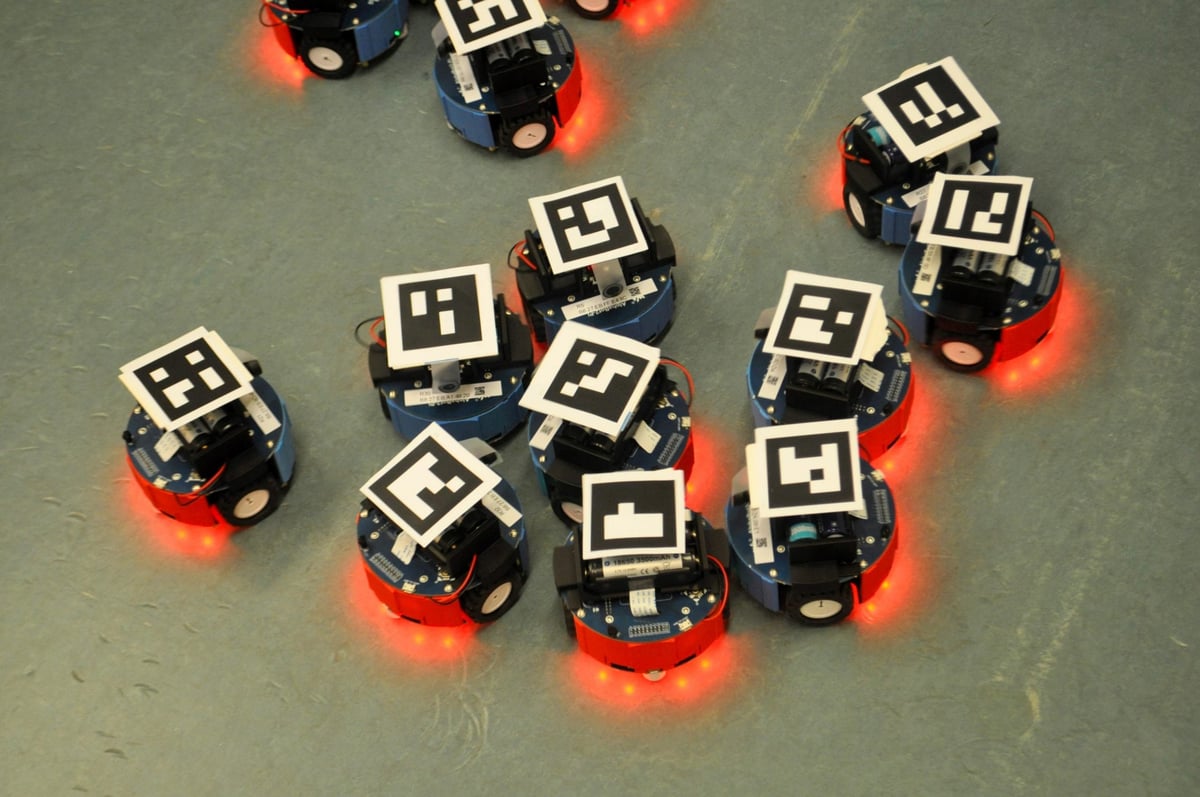 Controlled Randomness Boosts Robot Swarm Efficiency in Dense Spaces