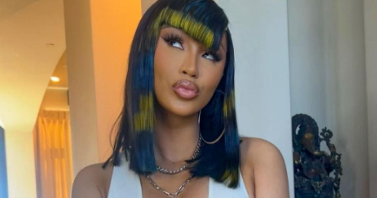 Cardi B Showcases Bold Polka-Dot Swimsuit at Paris Fashion Week