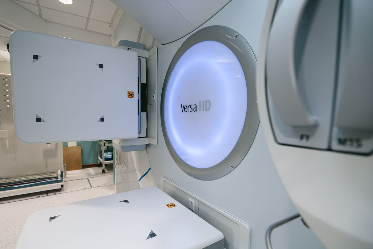 Close-up of Versa HD radiotherapy machine in a clinical setting.