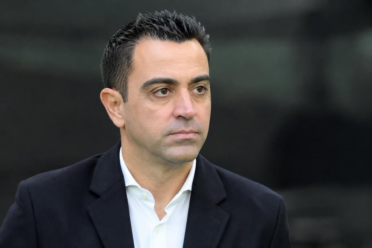 create an realistic image about Xavi Hernandez not in sport clothes