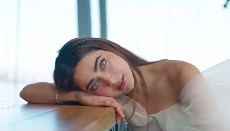 بالصور: دانا صلاح أول فنانة اردنية تظهر صورتها على لوحة في تايمز سكوير نيويورك